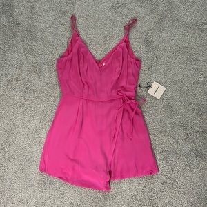 Hot pink romper, size medium. Never worn.